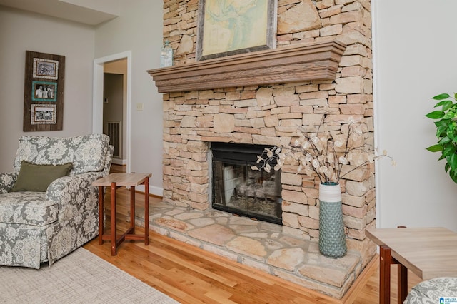 212 Bellbrook Dr, Cropwell, AL 35054 - living area featuring a fireplace and wood finished floors