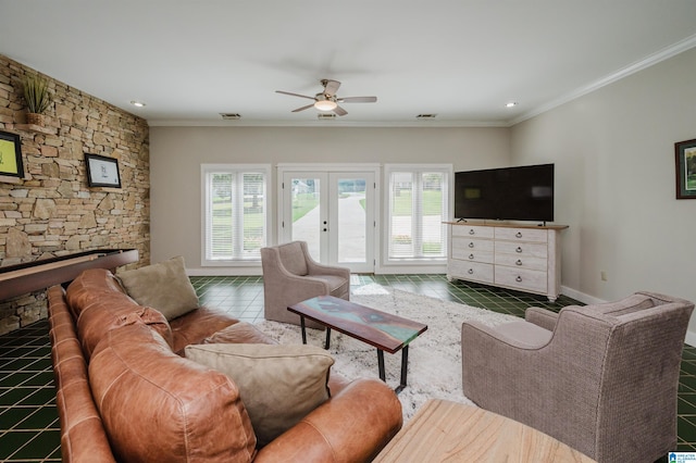 212 Bellbrook Dr, Cropwell, AL 35054 - living area with a fireplace, ceiling fan, ornamental molding, tile patterned flooring, and french doors