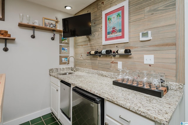 212 Bellbrook Dr, Cropwell, AL 35054 - indoor wet bar featuring fridge and dark tile patterned flooring