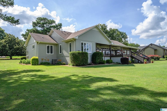 212 Bellbrook Dr, Cropwell, AL 35054 - view of front facade featuring a front yard, roof with shingles, and stairway