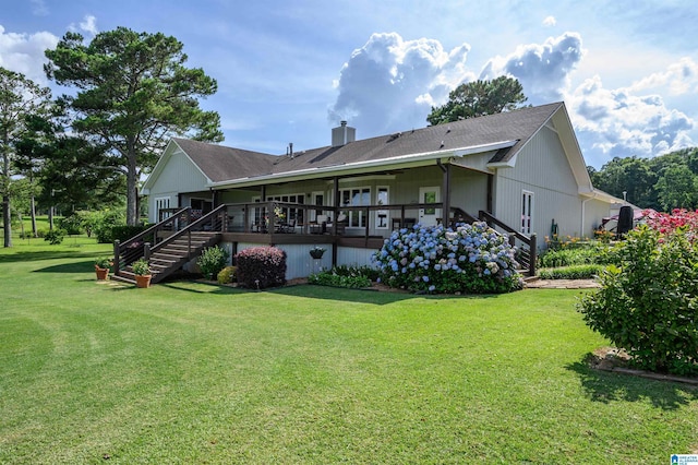 212 Bellbrook Dr, Cropwell, AL 35054 - rear view of property with stairway, a yard, a chimney, a wooden deck, and roof with shingles