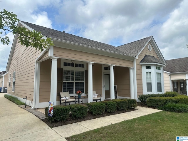5433 Wisteria Trce, Trussville, AL 35173 - view of front facade featuring covered porch and a shingled roof