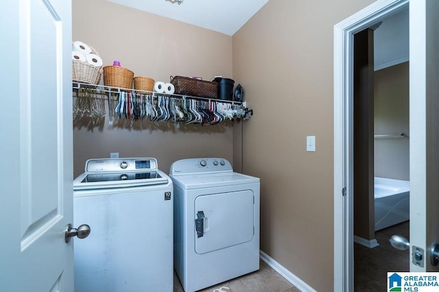 214 Quail Ridge Rd, Helena, AL 35080 - laundry area with independent washer and dryer and tile patterned floors
