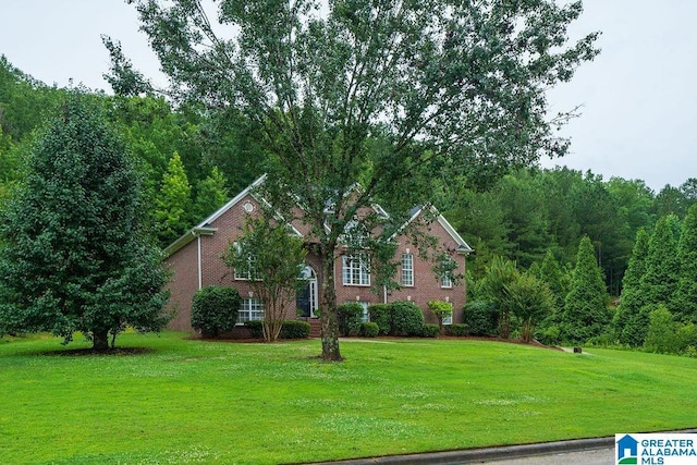 214 Quail Ridge Rd, Helena, AL 35080 - traditional-style house featuring a front lawn and brick siding