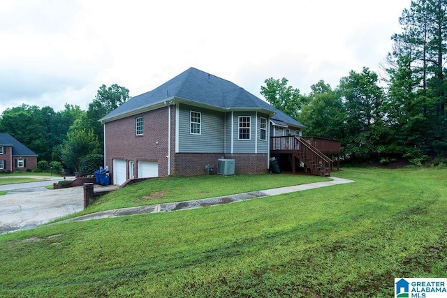 214 Quail Ridge Rd, Helena, AL 35080 - view of property exterior featuring a garage, stairs, brick siding, and a yard