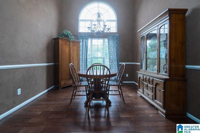 214 Quail Ridge Rd, Helena, AL 35080 - dining space featuring a chandelier, dark wood-type flooring, and a high ceiling