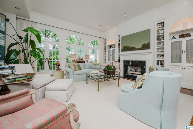 101 Mountain Ave, Mountain Brook, AL 35213 - living area with ornamental molding, a high end fireplace, and built in shelves