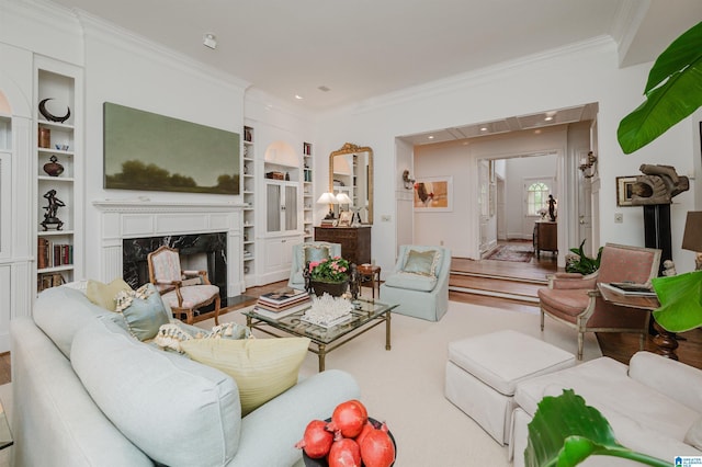 101 Mountain Ave, Mountain Brook, AL 35213 - living room featuring ornamental molding, built in features, and a premium fireplace