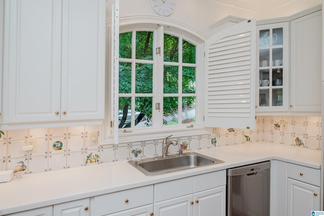 101 Mountain Ave, Mountain Brook, AL 35213 - kitchen with dishwasher, decorative backsplash, white cabinetry, and glass insert cabinets