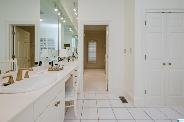 101 Mountain Ave, Mountain Brook, AL 35213 - bathroom with vanity, tile patterned floors, and a closet
