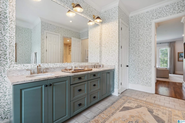 1528 Wellington Rd, Homewood, AL 35209 - bathroom with ornamental molding, double vanity, wallpapered walls, tile patterned floors, and recessed lighting
