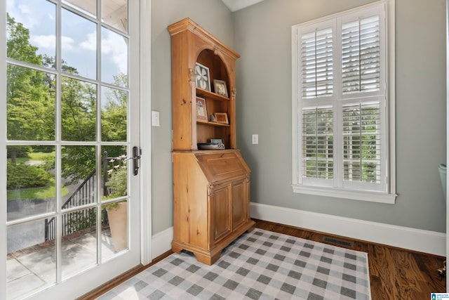 1528 Wellington Rd, Homewood, AL 35209 - doorway featuring baseboards and light wood-type flooring