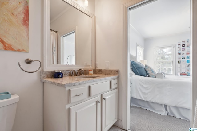1528 Wellington Rd, Homewood, AL 35209 - ensuite bathroom featuring vanity and crown molding