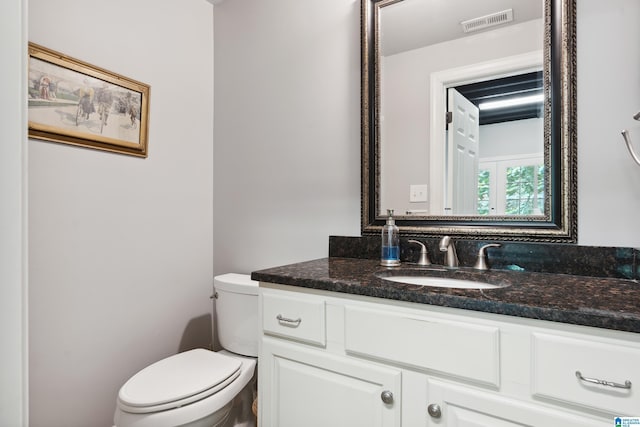 1528 Wellington Rd, Homewood, AL 35209 - half bath featuring vanity and toilet