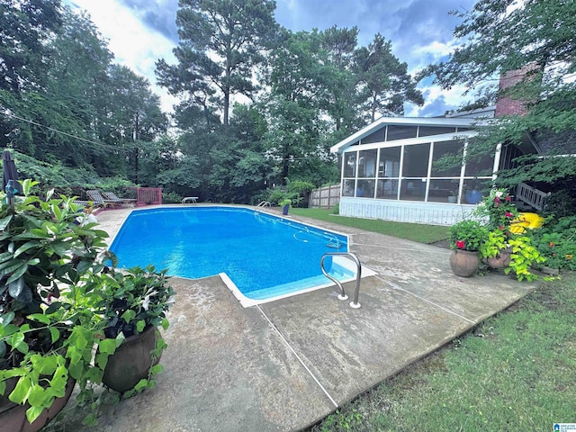 3224 Monte Doro Dr, Hoover, AL 35216 - outdoor pool with a sunroom, a patio area, and view of scattered trees