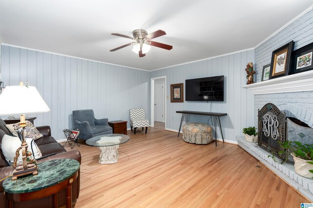 3224 Monte Doro Dr, Hoover, AL 35216 - living room with ornamental molding, a ceiling fan, wood finished floors, and a fireplace