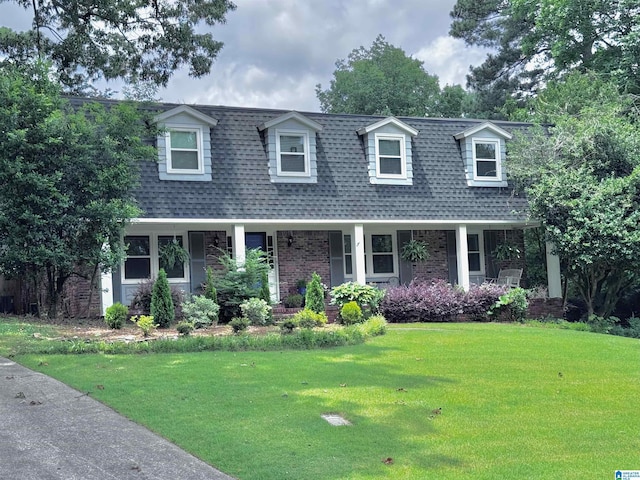3224 Monte Doro Dr, Hoover, AL 35216 - view of front facade featuring brick siding, a shingled roof, a front yard, and covered porch