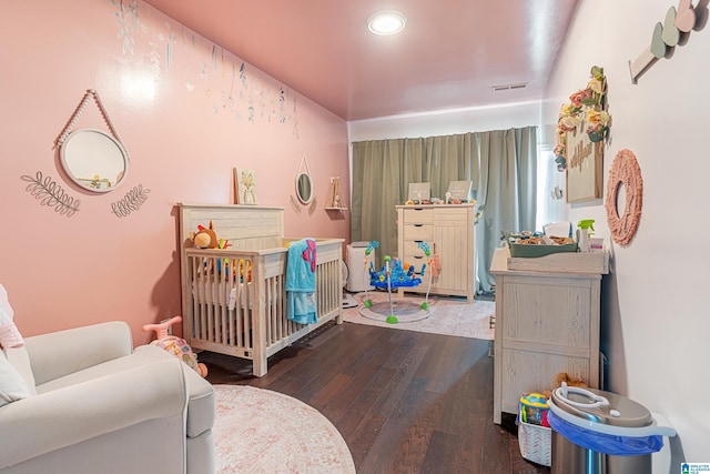 664 Jent Rd, Cordova, AL 35550 - bedroom with hardwood / wood-style floors, a crib, and recessed lighting