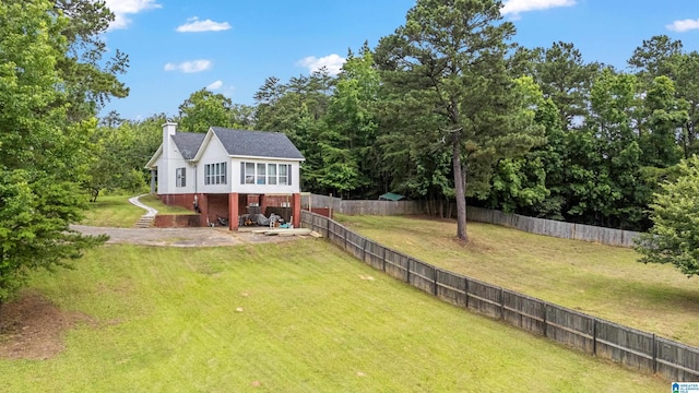 664 Jent Rd, Cordova, AL 35550 - fenced backyard featuring a patio area