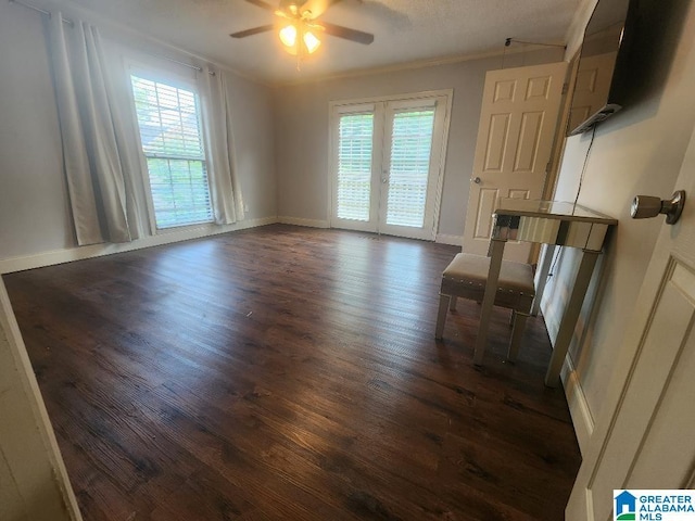 2030 Carraway St, Birmingham, AL 35235 - unfurnished dining area featuring dark wood-type flooring, ceiling fan, and crown molding