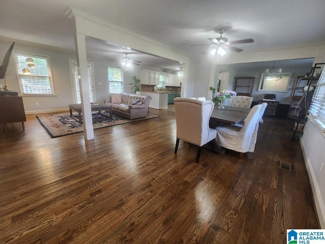 2030 Carraway St, Birmingham, AL 35235 - dining room with a ceiling fan, wood finished floors, and ornamental molding