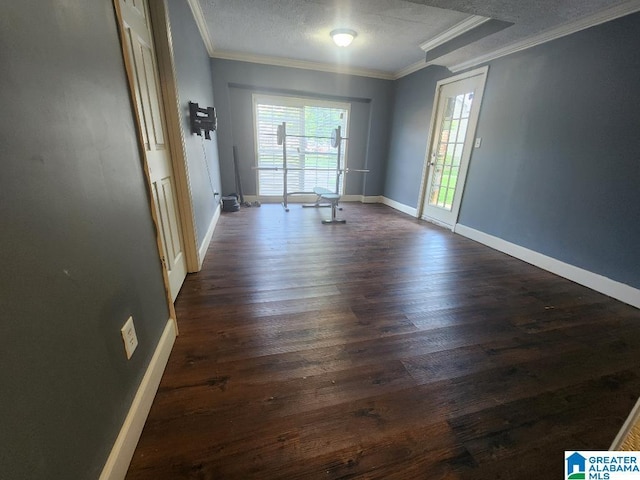 2030 Carraway St, Birmingham, AL 35235 - unfurnished room featuring dark wood-style floors, crown molding, and a textured ceiling