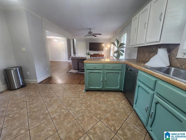 2030 Carraway St, Birmingham, AL 35235 - kitchen featuring dishwasher, green cabinetry, ornamental molding, a peninsula, and open floor plan