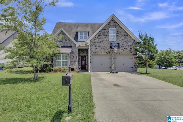 2165 Overlook Pl, Trussville, AL 35173 - traditional-style home with brick siding, a front yard, driveway, and a garage