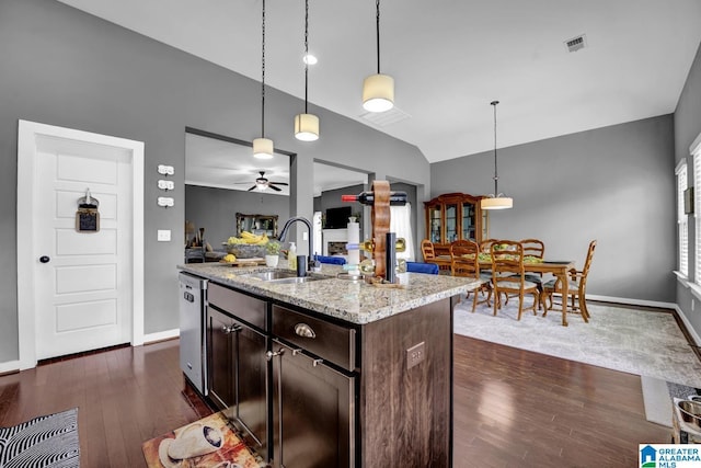 2165 Overlook Pl, Trussville, AL 35173 - kitchen featuring dark wood-style flooring, ceiling fan, dark brown cabinets, lofted ceiling, and light stone counters