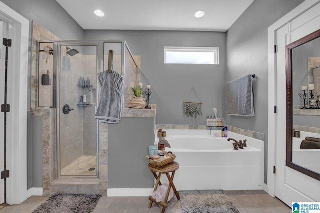 2165 Overlook Pl, Trussville, AL 35173 - bathroom with a bath, a stall shower, and tile patterned flooring