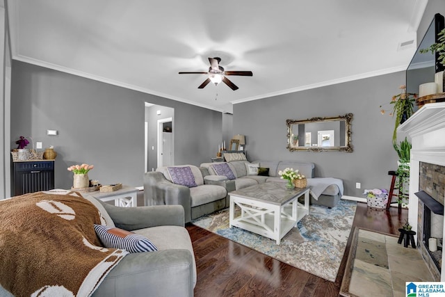 2165 Overlook Pl, Trussville, AL 35173 - living room with wood finished floors, a ceiling fan, ornamental molding, and a fireplace with flush hearth