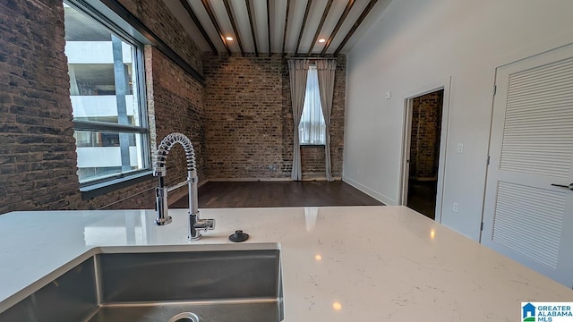 1801 2nd Ave N Unit 406, Birmingham, AL 35203 - kitchen view of wood finished floors and light countertops