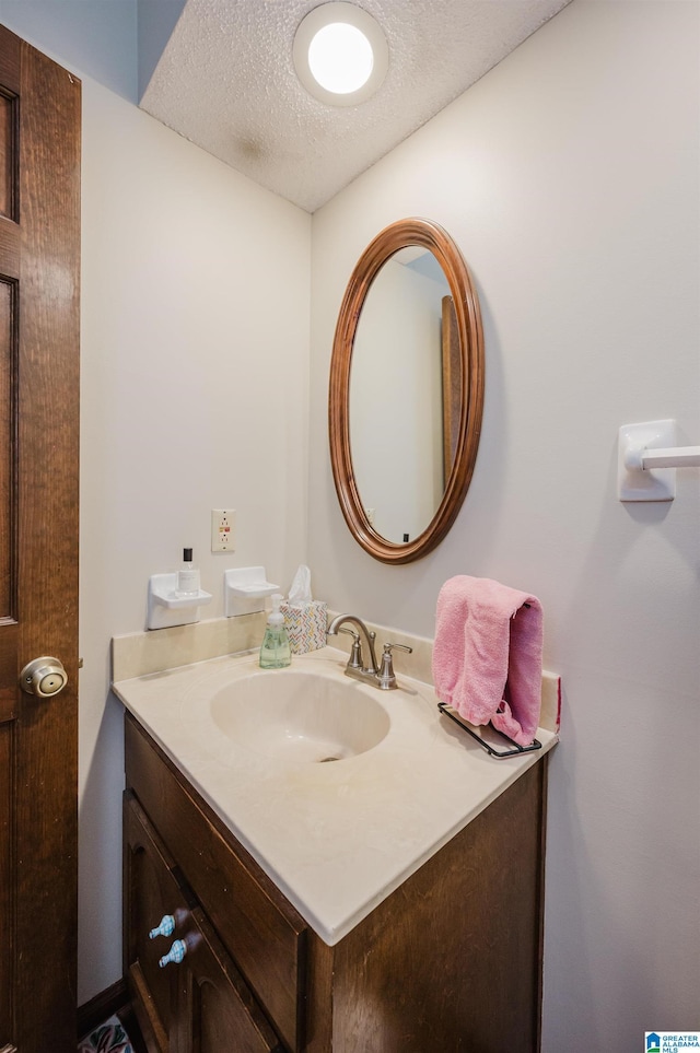 2418 Richelieu Ln, Hoover, AL 35216 - bathroom with vanity and a textured ceiling