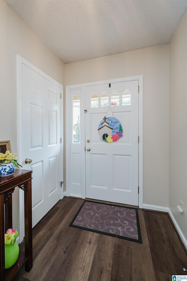 2418 Richelieu Ln, Hoover, AL 35216 - entryway featuring dark wood-style floors and baseboards