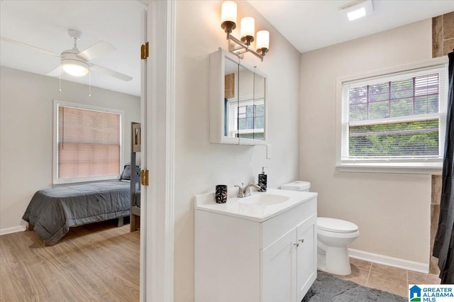 1818 Hillcrest Rd NE, Center Point, AL 35215 - full bath with vanity, ensuite bathroom, and a ceiling fan