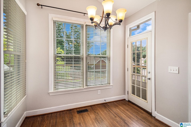 832 Meadow Ridge Ln, Birmingham, AL 35242 - unfurnished dining area with a chandelier, plenty of natural light, and dark wood-type flooring