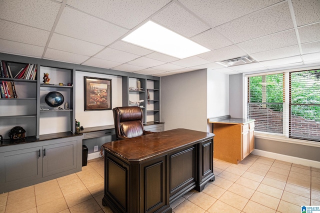832 Meadow Ridge Ln, Birmingham, AL 35242 - office area with built in shelves, a paneled ceiling, and light tile patterned floors