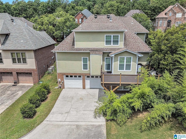 832 Meadow Ridge Ln, Birmingham, AL 35242 - view of front of home featuring an attached garage, driveway, and a shingled roof