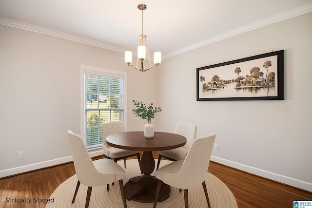 832 Meadow Ridge Ln, Birmingham, AL 35242 - dining area with a chandelier, crown molding, and wood finished floors