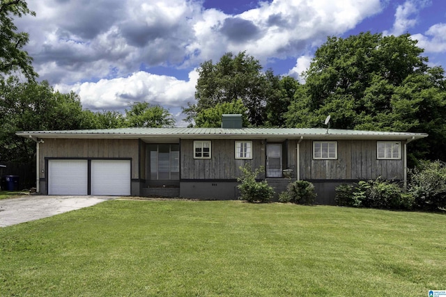 742 Valley St, Hoover, AL 35226 - single story home featuring a front lawn, an attached garage, a chimney, driveway, and a metal roof