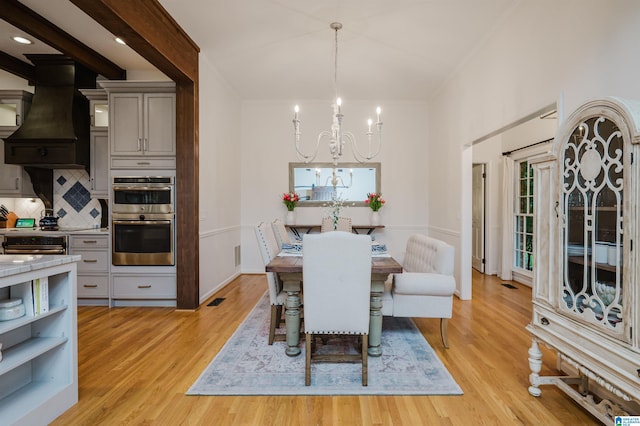 3204 Woodford Way, Birmingham, AL 35242 - dining area with a chandelier, light wood-style flooring, and ornamental molding