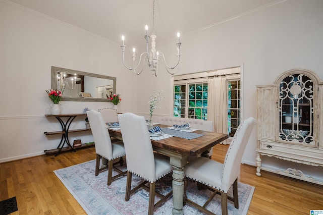 3204 Woodford Way, Birmingham, AL 35242 - dining space with ornamental molding, a chandelier, and wood finished floors
