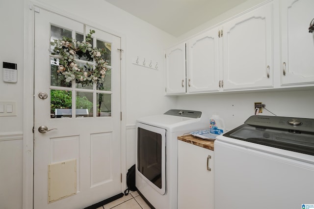 3204 Woodford Way, Birmingham, AL 35242 - laundry room featuring washing machine and clothes dryer, cabinet space, and light tile patterned floors