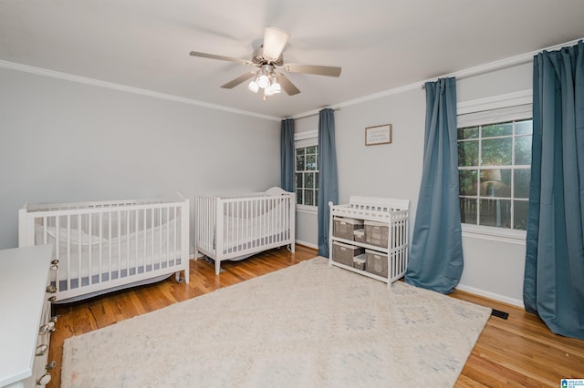 3204 Woodford Way, Birmingham, AL 35242 - bedroom featuring multiple windows, crown molding, and wood finished floors
