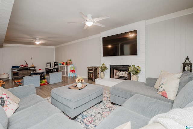 3204 Woodford Way, Birmingham, AL 35242 - living room with a ceiling fan, ornamental molding, wood finished floors, and a fireplace