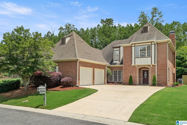 5912 Waterscape Pass, Hoover, AL 35244 - view of front of house with an attached garage, brick siding, a front lawn, concrete driveway, and roof with shingles