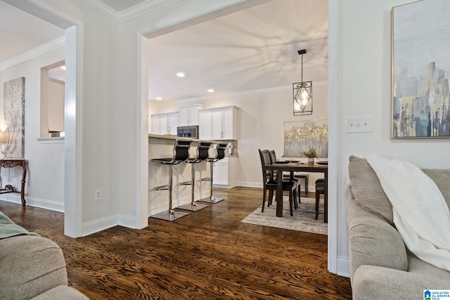 5912 Waterscape Pass, Hoover, AL 35244 - living room featuring crown molding, dark wood-style floors, and recessed lighting