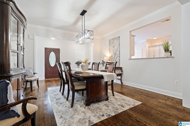 5912 Waterscape Pass, Hoover, AL 35244 - dining area with crown molding and dark wood finished floors