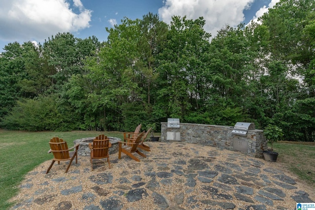 5912 Waterscape Pass, Hoover, AL 35244 - view of patio / terrace with exterior kitchen and a fire pit