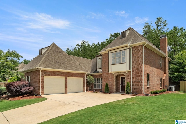 5912 Waterscape Pass, Hoover, AL 35244 - view of front of home with an attached garage, brick siding, a front yard, and driveway
